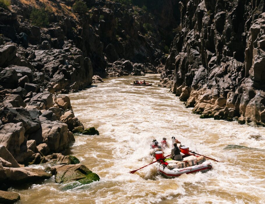 two rafts running whitewater rapids in Westwater Canyon