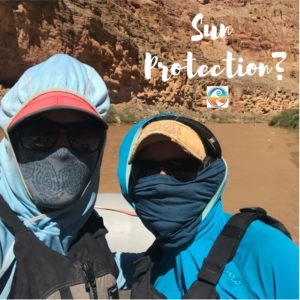 rafters wearing sun protection that is on a Grand Canyon rafting packing list