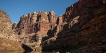 floating through calm section of the Colorado River in cataract Canyon