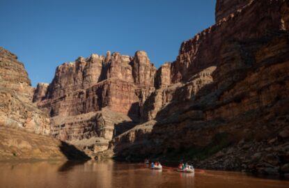 floating through calm section of the Colorado River in cataract Canyon