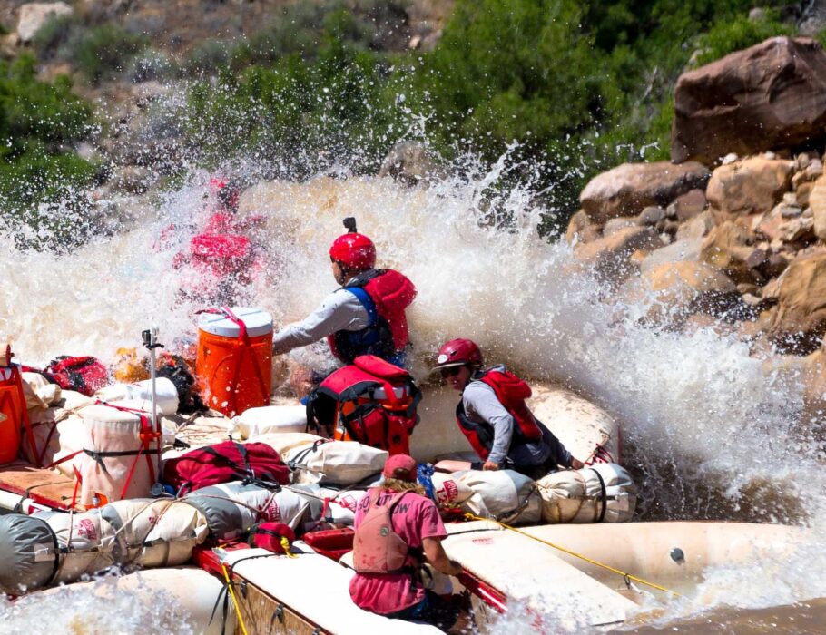 rafters running colorado river rapid in cataract canyon