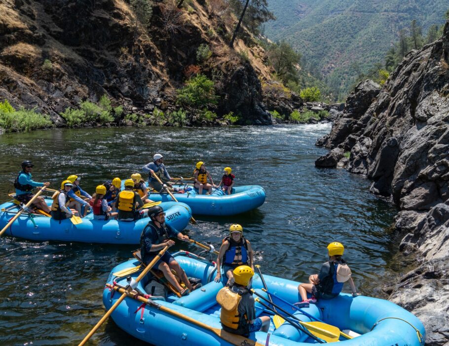 3 rafts floating below rapid on the Tuolumne River